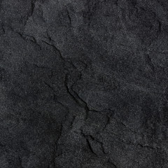 Dark grey black slate background or texture.