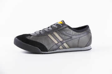 Female Black Sneaker on White Background, Isolated Product, Top View, Studio.