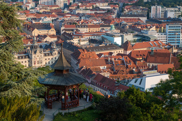 Graz, Austria - June 15th 2017: Tourists at a viewpoint overlooking the city of Graz