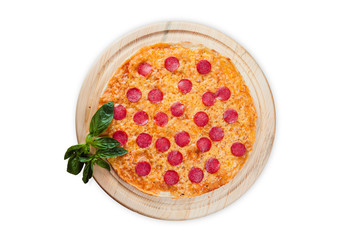 pizza on round wooden plates on a white background