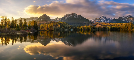 Sunset about glacial lake named Strbske Pleso in National Park High Tatras, Slovakia