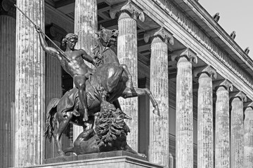 BERLIN, GERMANY, FEBRUARY - 13, 2017: The Dom, columns of Altes Museum and the bronze sculpture...