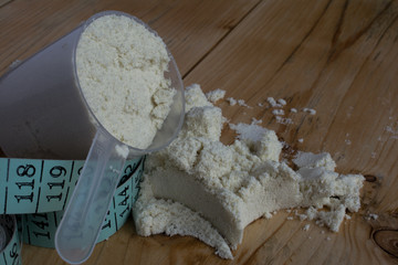 Whey protein with measuring tape