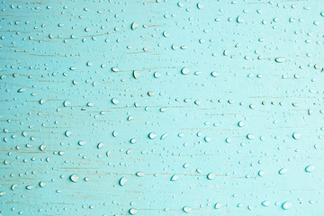 The blue background with small drops