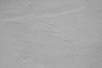 Light textured rough painting gray cement wall monochrome. Grunge vintage horizontal background.