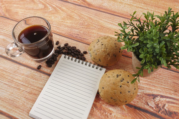 Hand typing on keyboard with management and business conceptual text.