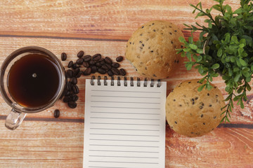 Hand typing on keyboard with management and business conceptual text.