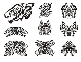 Wild animal symbols in tribal style. Unusual aggressive wolf head symbols formed by the head of an eagle. Black on white