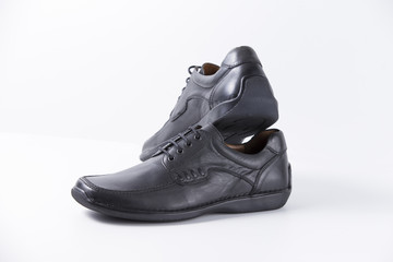 Male Black Shoe on White Background, Isolated Product, Top View, Studio.