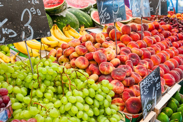 Fresh organic fruit at farmers market stall