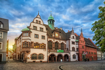 Old Town Hall (Altes Rathaus) on sunrise in Freiburg im Breisgau, Baden-Wurttemberg, Germany - obrazy, fototapety, plakaty