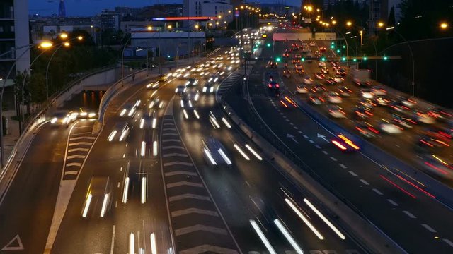 Cinemagraph of traffic at dusk in a main street of entry and exit of Barcelona. Top view. Long Exposure. Time Lapse