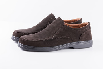 Male Brown Shoes on White Background, Isolated Product, Top View, Studio.