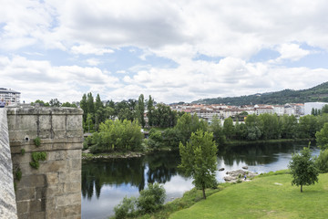 Fototapeta na wymiar Environment, Miño river passing through Orense Roman city located in Galicia. Spain