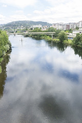 Miño river passing through Orense Roman city located in Galicia. Spain