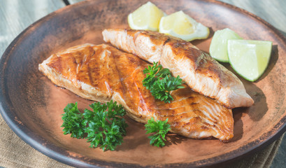 Roasted salmon steak with fresh parsley