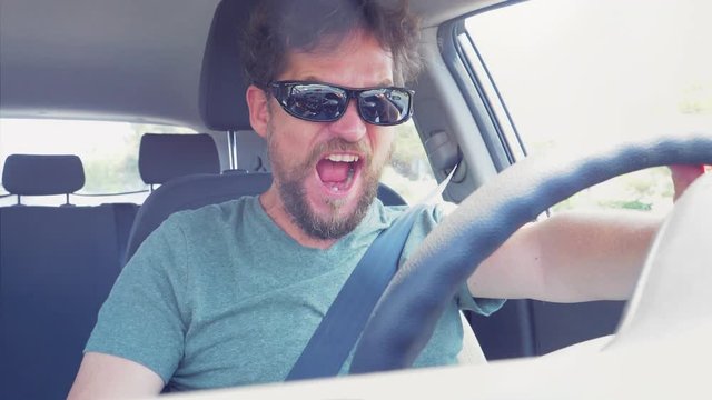 Funny man dancing with sunglasses driving car super slow motion 180fps light leaks