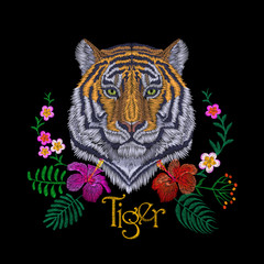 Tiger head tropic flower. Front view embroidery patch sticker. Orange striped black wild animal stitch texture textile print. Jungle logo vector illustration