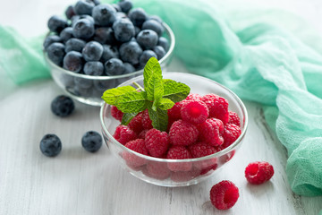 Fresh summer berries, raspberry, blueberry, raw summer vegan food