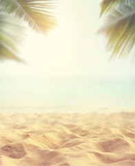 Sand with blurred Palm and tropical beach bokeh background, Summer vacation and travel concept....