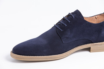 Male Blue Shoe on White Background, Isolated Product, Top View, Studio.