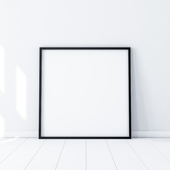 Square Poster with Black Frame Mockup standing on the floor in white room. 3d rendering