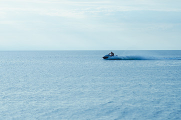 Resort vacation. Jet ski in the sea at sunset
