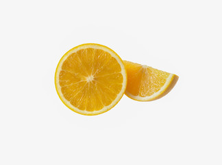 Fresh orange fruit cut half and slice on white  background