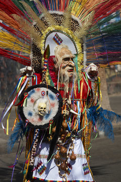 Tobas dancer in traditional Andean costume performing at the annual Carnaval Andino con la Fuerza del Sol in Arica, Chile.