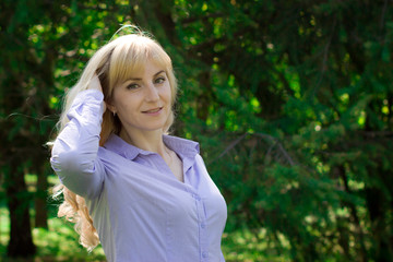 Portrait of a woman outdoors.