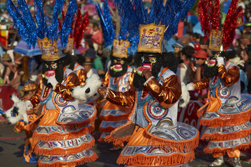 Morenada dancers in traditional Andean costume performing at the annual Carnaval Andino con la...