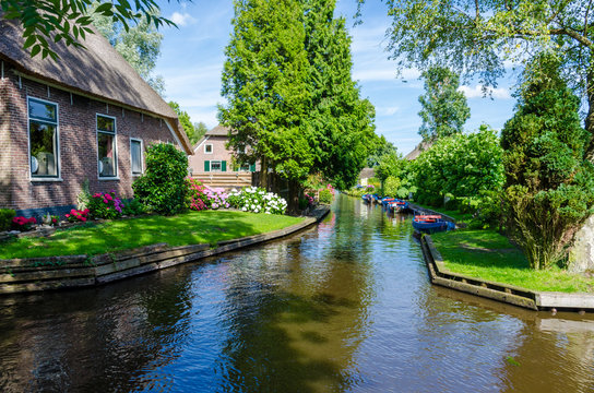 View of typical houses of Giethoorn, Netherlands. 
