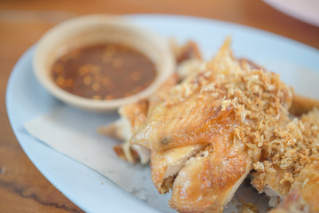 Chicken grilled with garlic fried thai style,soft focus
