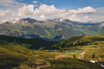Fototapeta na wymiar Swiss mountain train crossed Alps