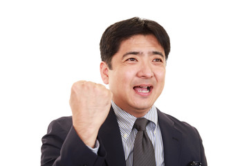 ガッツポーズのビジネスマン
