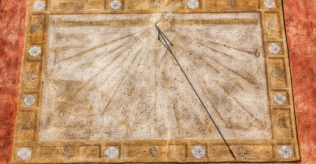 in italy sundial and   antique  wall - obrazy, fototapety, plakaty