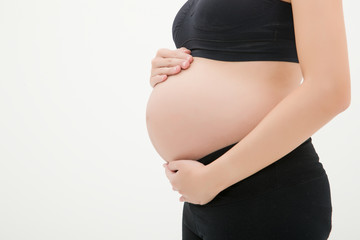 Pregnant Woman Patting Her Belly