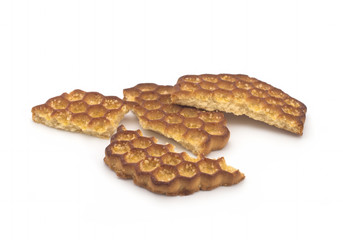 Broken cookies on a white background