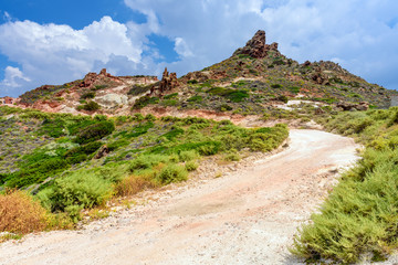 Mountain road to Areti village in north western part of Milos island. Cyclades, Greece.