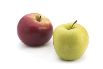 Red and green apples on a white background