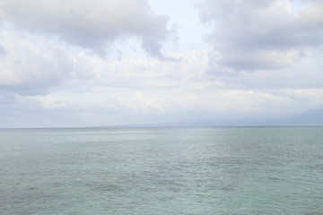 Sea and cloudy sky