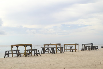 Fototapeta na wymiar Table and chair nearby the sea at Gili Trawangan Lombok Indonesia