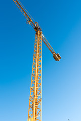 Naklejka premium yellow crane building construction