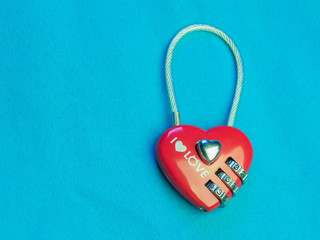 red heart shape of the key lock with encrypting numbers