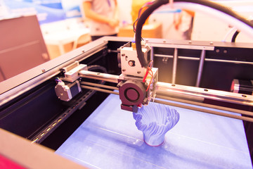 3D printer printing figure close-up macro