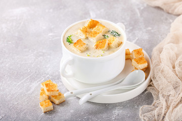 Broccoli cheese cream soup. Selective focus. Copy space