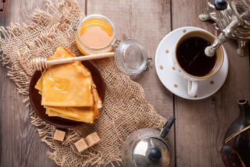 Pancakes with honey. Selective focus. Top view