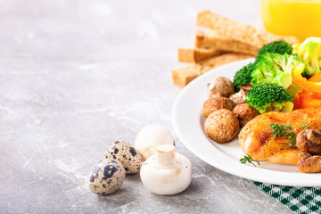 Healthy lunch - chicken fillet, mushrooms, broccoli and paprika. Selective focus. Copy space
