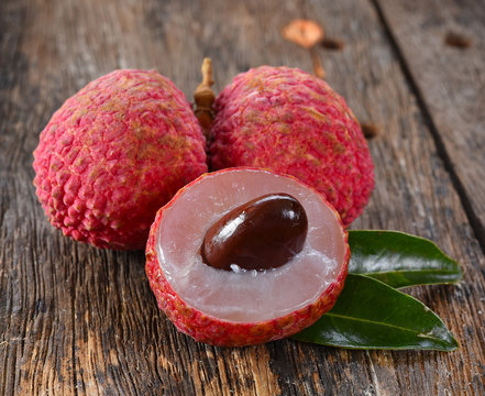 Lychee or Litchi on a wooden table.