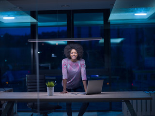 black businesswoman using a laptop in startup office